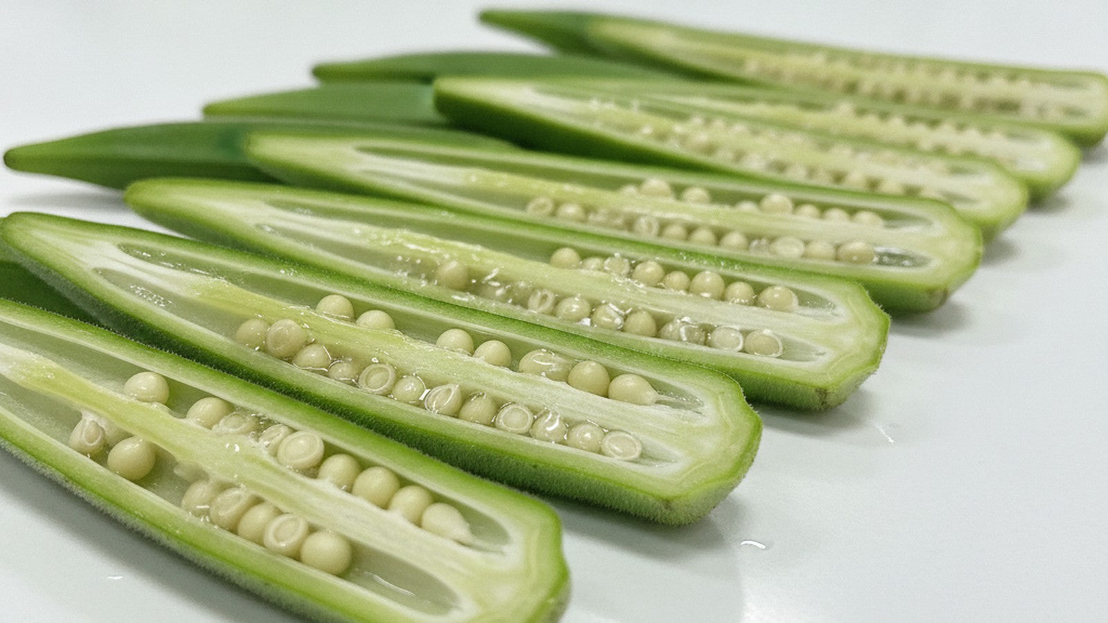 Okra pods cut open showing mucilage