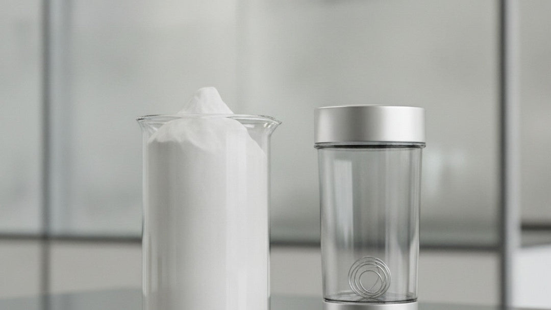 Beaker of whey protein powder beside shaker bottle on laboratory counter