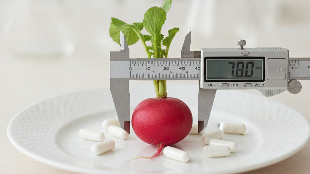 Red radish with green leaves on white plate surrounded by supplement capsules