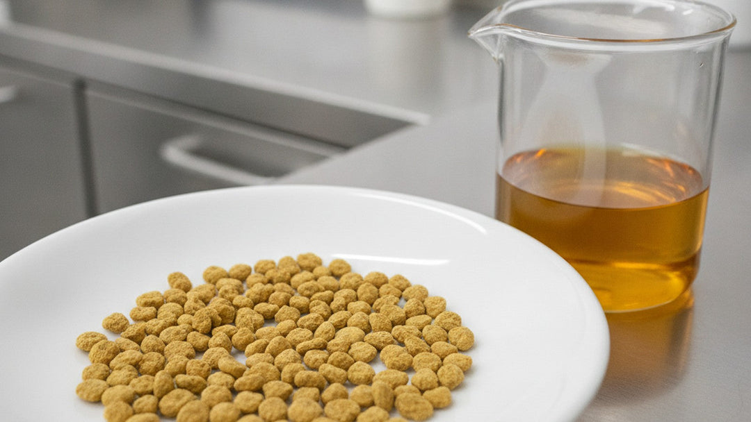 Magnified rye pollen grains beside extract beaker on laboratory surface