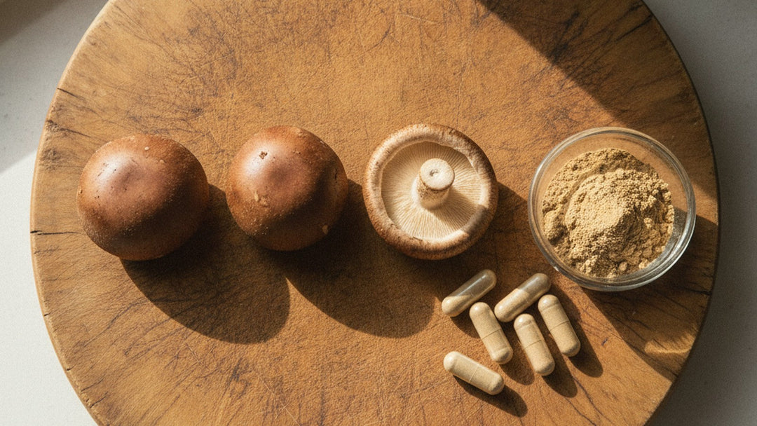 Fresh shiitake mushrooms on cutting board with supplement powder and capsules
