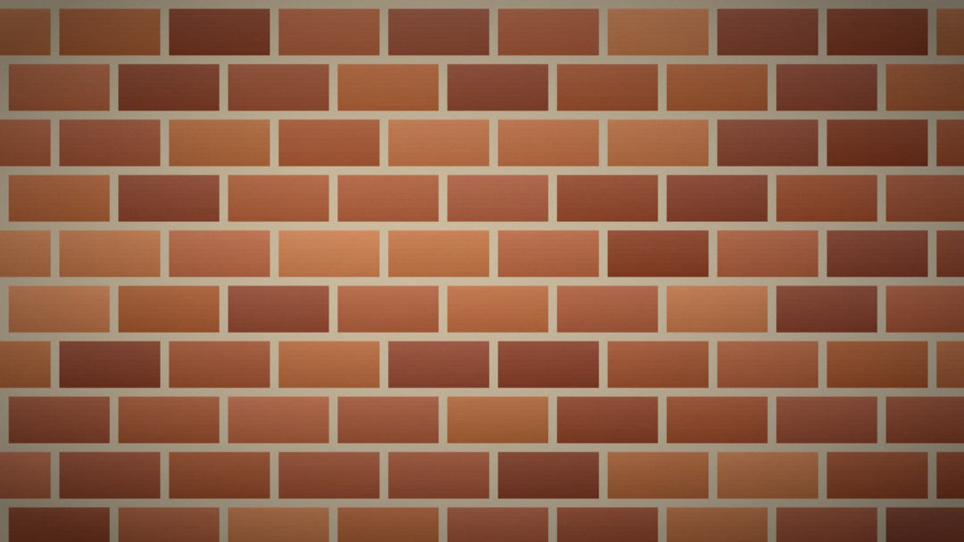 Warm terracotta brick wall with pale mortar freshly sealing every seam